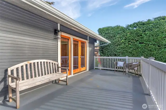 The deck off the front of the home --with western views.  A wonderful place to soak in the sunshine!