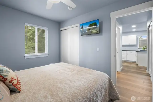 Ceiling fans with remotes in every bedroom.