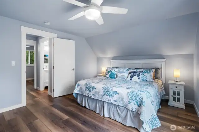The pleasing color palette with contrasting white trim continues upstairs, as well as the hard surface flooring.
