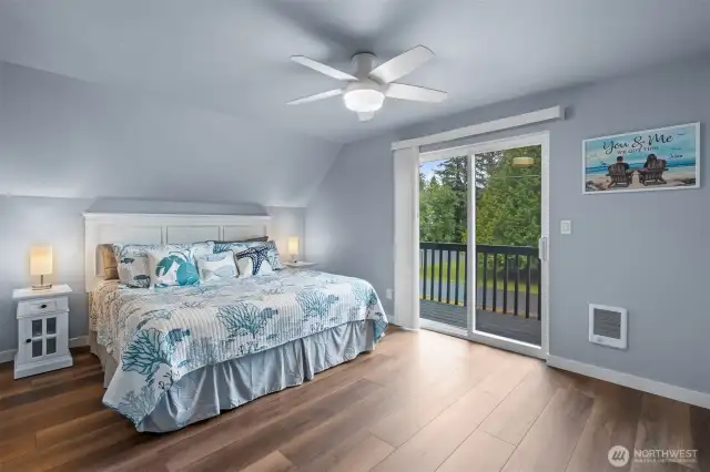 Slider in Primary bedroom opens to private balcony. Wall heat.