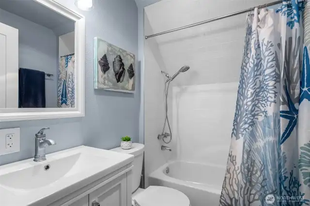 Full bathroom on upper level with shower/tub combo.