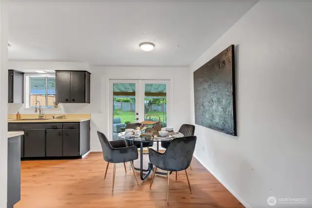 Dining Room w/ French Doors that lead to Outdoor Living Space.