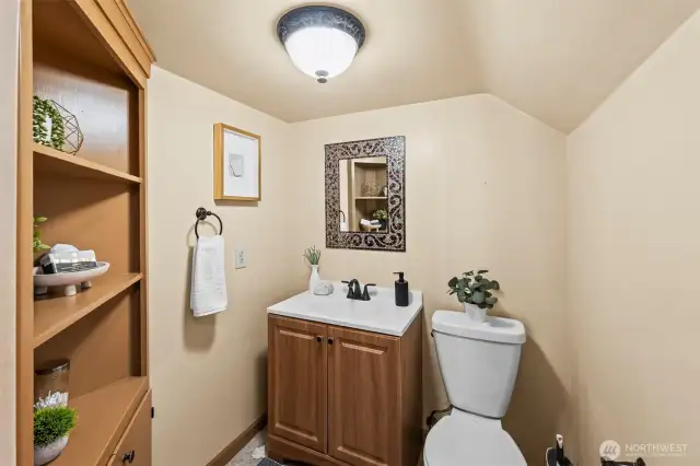 Centrally located half bath upstairs.