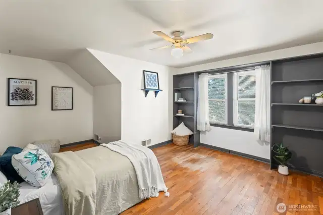 Second upstairs bedroom with built-ins and large closet.