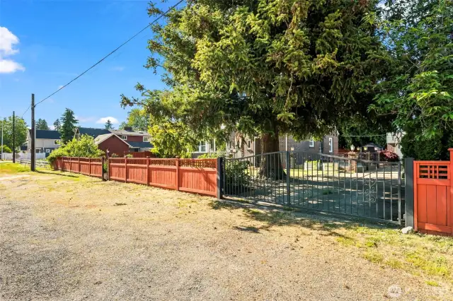 Gated entry and long driveway offer privacy and curb appeal.