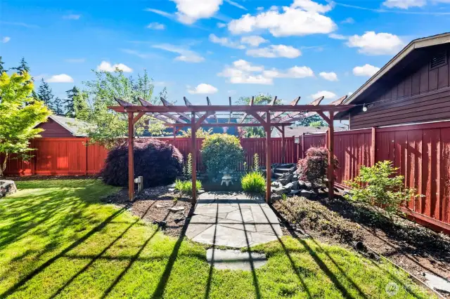 Beautiful arbor adds garden charm.
