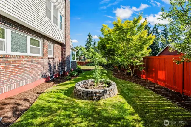 Beautifully landscaped, complete with fruit trees.