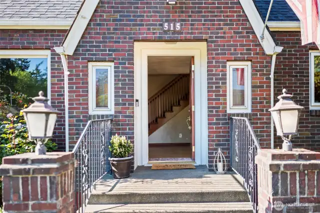 Inviting storybook entry framed by beautiful brickwork.
