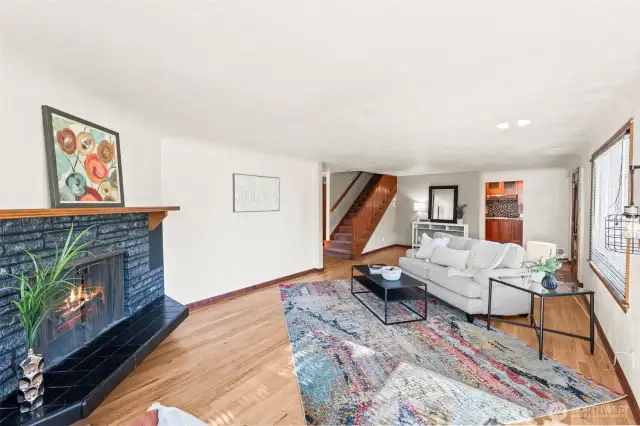 Hardwood floors, rich wood millwork, and coved ceilings.