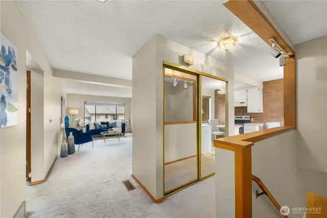 Entry way w/stairs to lower level on right and main floor living