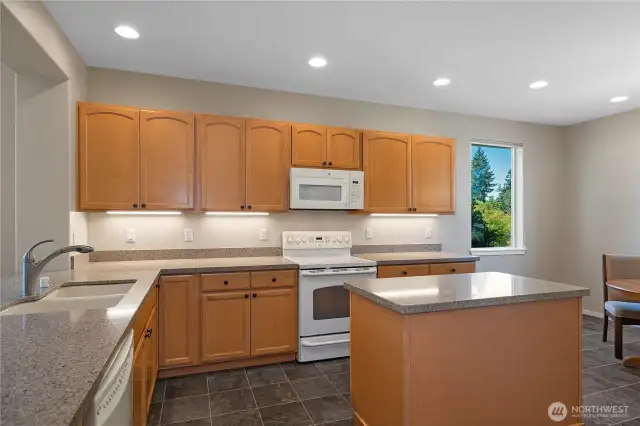 Lots of light in the kitchen with eating nook.