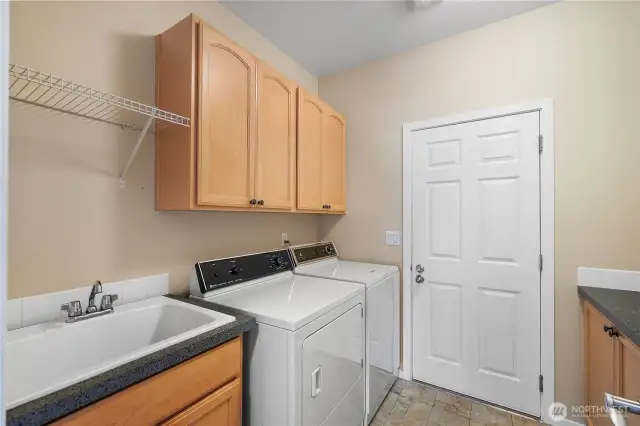 Utility room with sink.