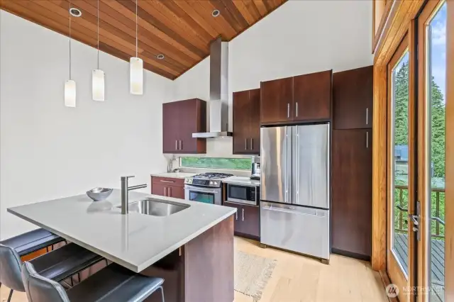 Kitchen equipped with JennAir stainless steel appliances