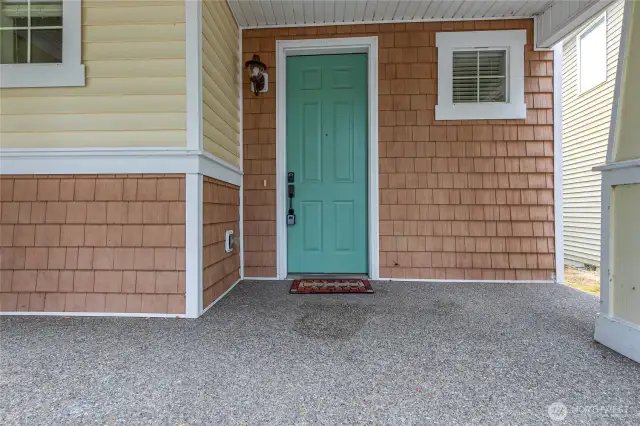 Covered front porch. Perfect for a bench, swing, or?
