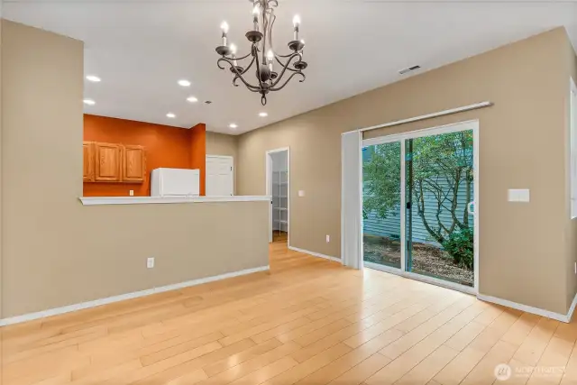 View of empty dining room waiting for your touches.