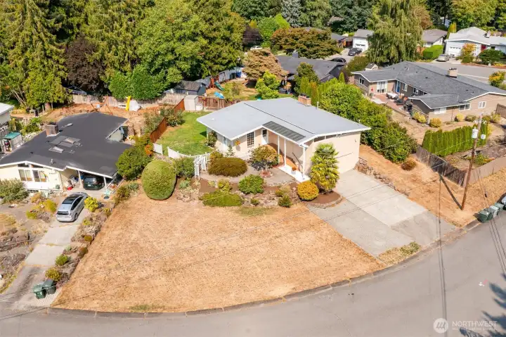 Fabulous lot with large backyard, up to 40' RV parking with 30 amp service, and a whole house generator!