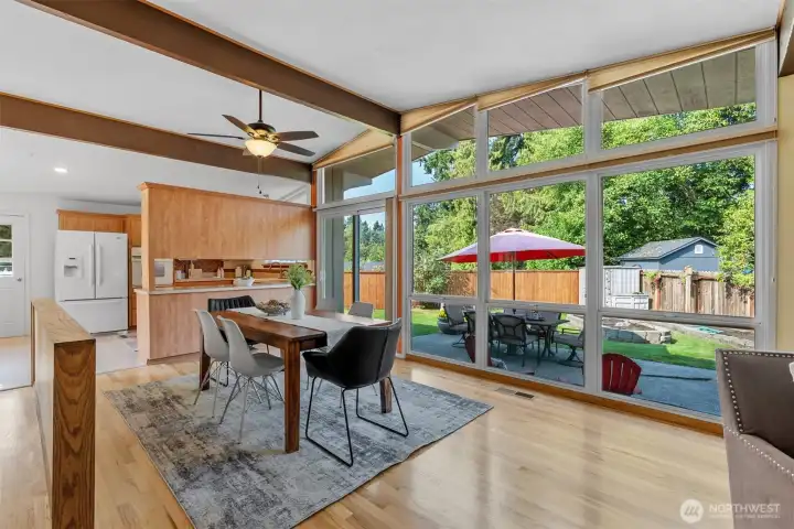 Freshly refinished hardwood flooring throughout and floor to ceiling windows bring in tons of natural light.