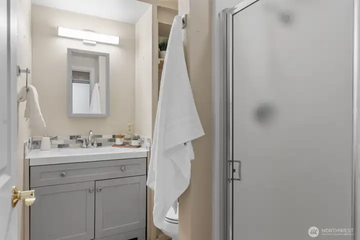 Updated lower level three quarter bath is amazing for overnight guests.