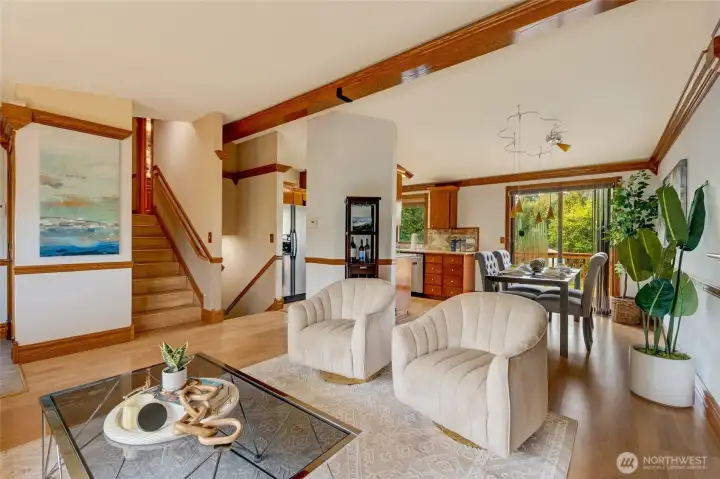 The main floor is designed for modern, open-concept living, seamlessly connecting the living, dining, and stunning granite kitchen.