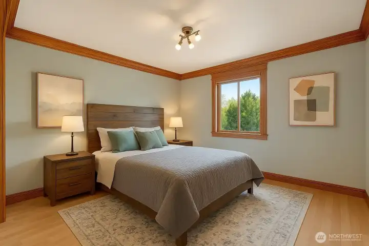 Two additional bedrooms offer generous space and versatility. [This photo is virtually staged]