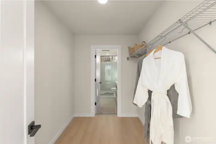 Large walk thru closet to primary bath