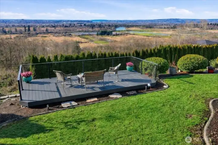 This unique observation deck was designed to capture the view -- the ultimate spot for sunrise coffee, sunset evenings and unforgettable gatherings. Updated with brand new cable railing and freshly refinished decking.