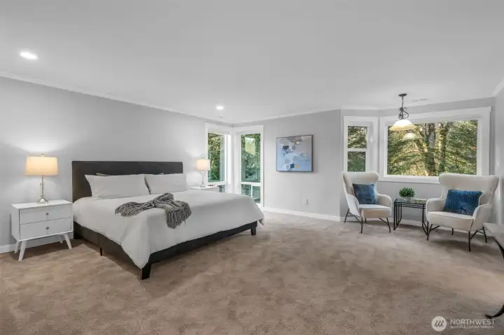 Expansive, light-filled, private primary suite retreat