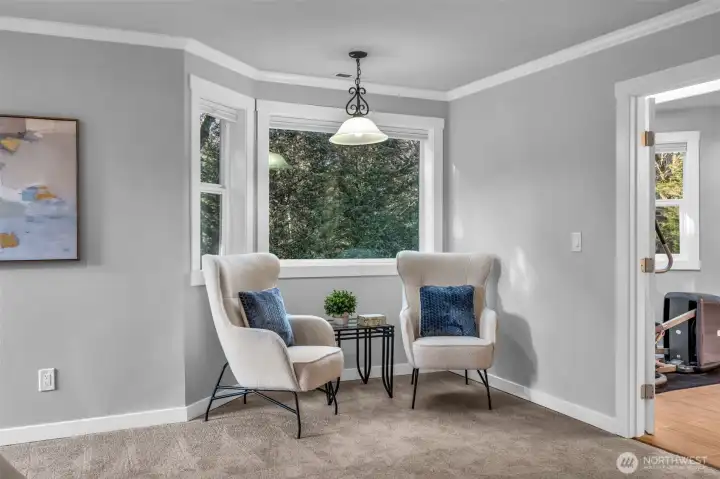 Cozy sitting area in the primary bedroom