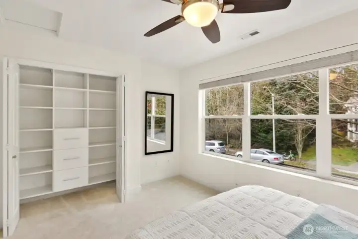 Every inch of the second spare room is maximized with high-end, custom closet shelving for ultimate functionality.