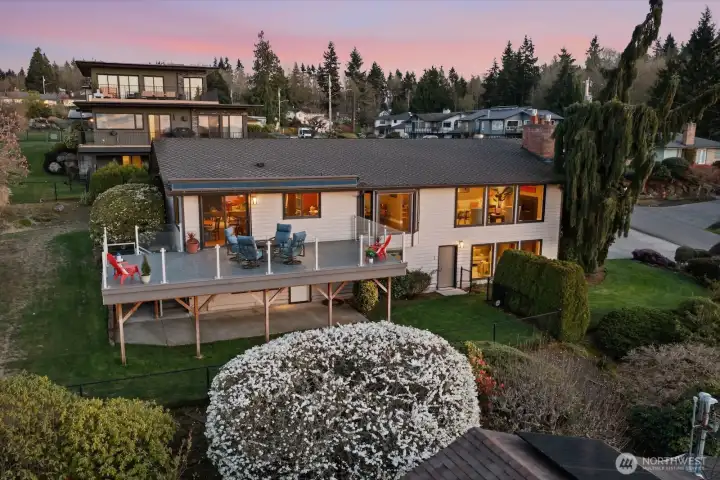 Large deck and spacious yard offers privacy