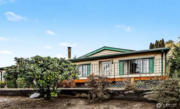 Front of home overlooking Reflection Lake to the southwest for great year round light.