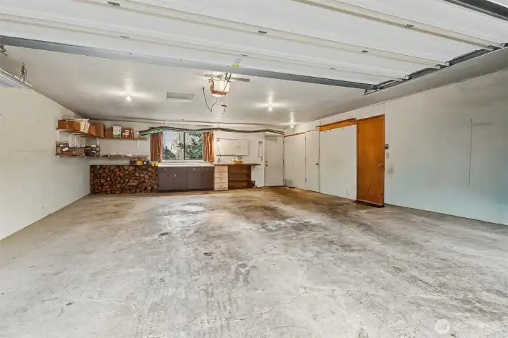 Oversized (672 sq ft per SCR) attached 2 car garage and workshop.