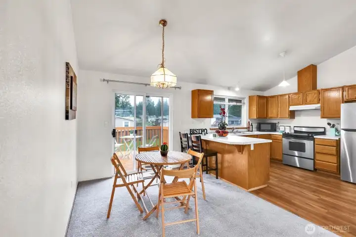 Open kitchen with formal dining.
