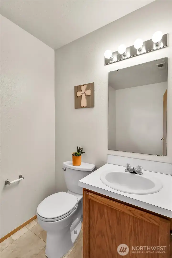 Convenient half bath.