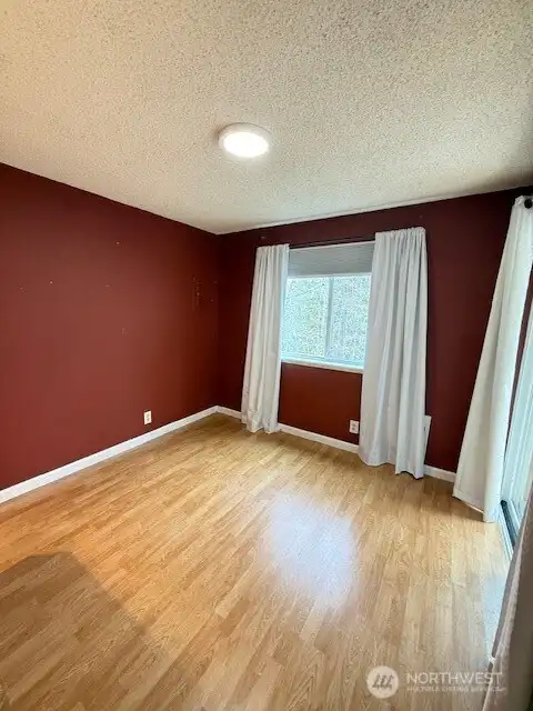 Dining room with wooded views