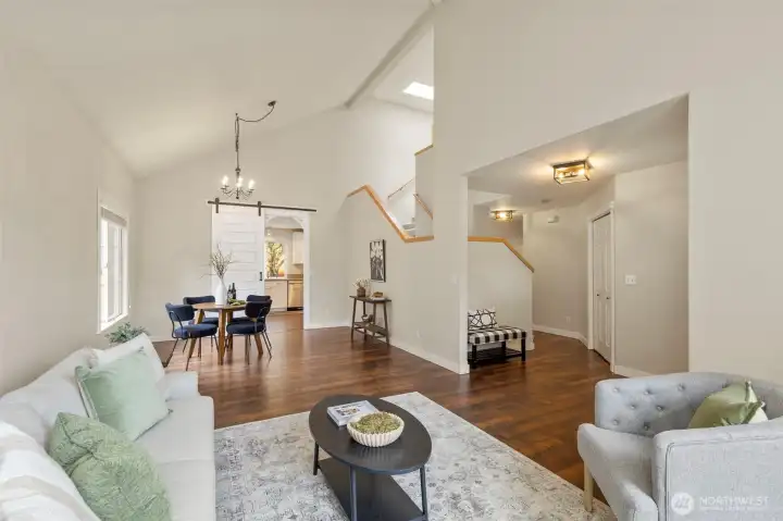 Vaulted Ceilings, dining and front living room, leading to kitchen