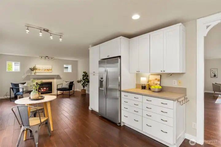 Kitchen has wood-like tiles with radient heat.