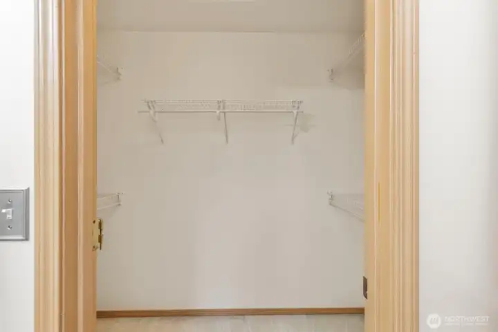 Walk-in closet in primary bath