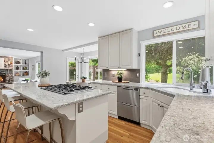 Updated kitchen with quartz counters, undermount sink. Updated kitchen with quartz counters, undermount sink.