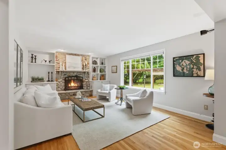 Informal gathering room off the kitchen with hardwood floors. Informal gathering room off the kitchen with hardwood floors.