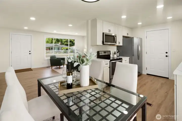 Eating space with seamless flow between living room & kitchen.