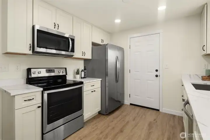 Thoughtfully updated kitchen with stainless steel appliances.