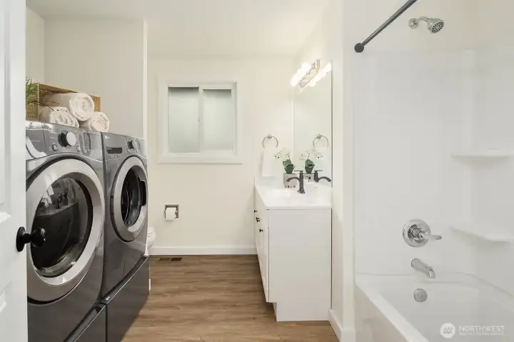 Bathroom & laundry with utility sink.