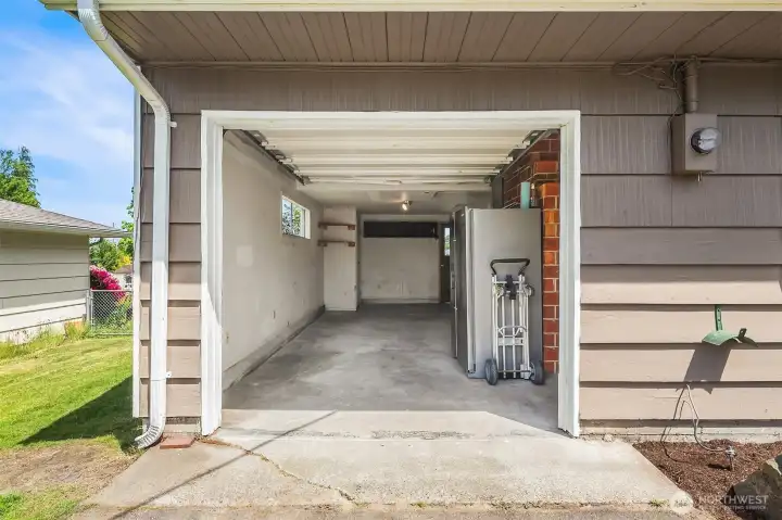 Garage with ample space for storage.