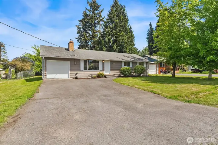 Spacious driveway & front yard.