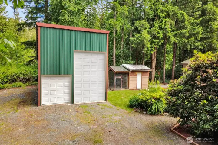 Virtually modified image depicting the planned large overhead door. Seller intends to install thelarge overhead door prior to closing. Actual appearance may vary until installation is completed.