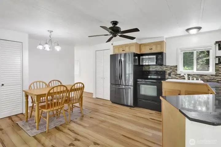 Open kitchen with abundant cabinetry, generous counter space, and excellent functionality.