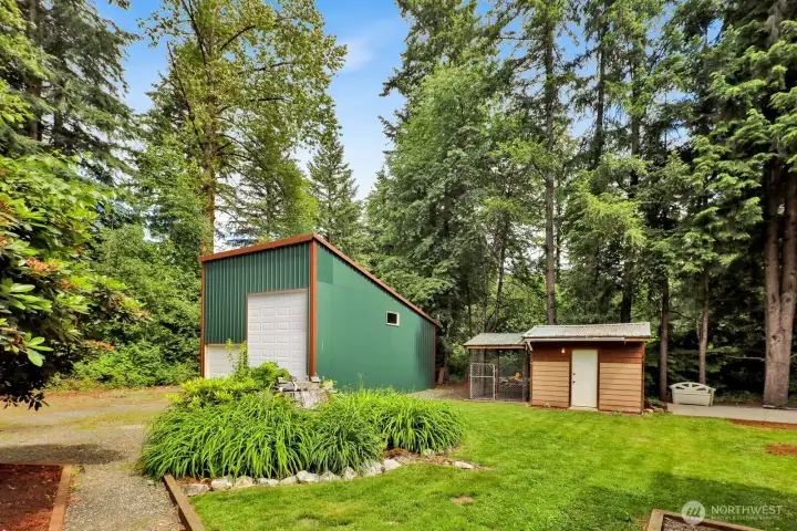Home and detached shop positioned for convenience while maintaining a private, spacious setting.