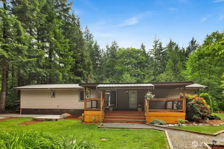 Home and detached shop positioned for convenient everyday use.