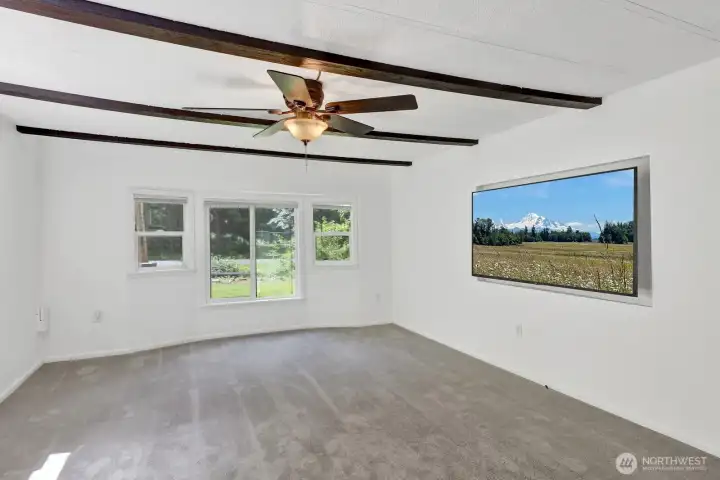 Living room perspective highlighting large windows and open sightlines.
